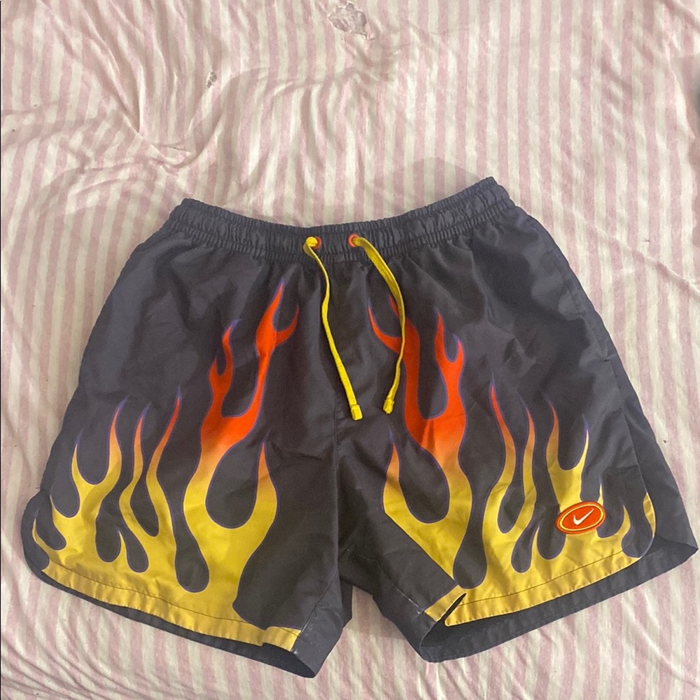 Nike Black and Red Swim Trunks with Dynamic Flame Design (USED)